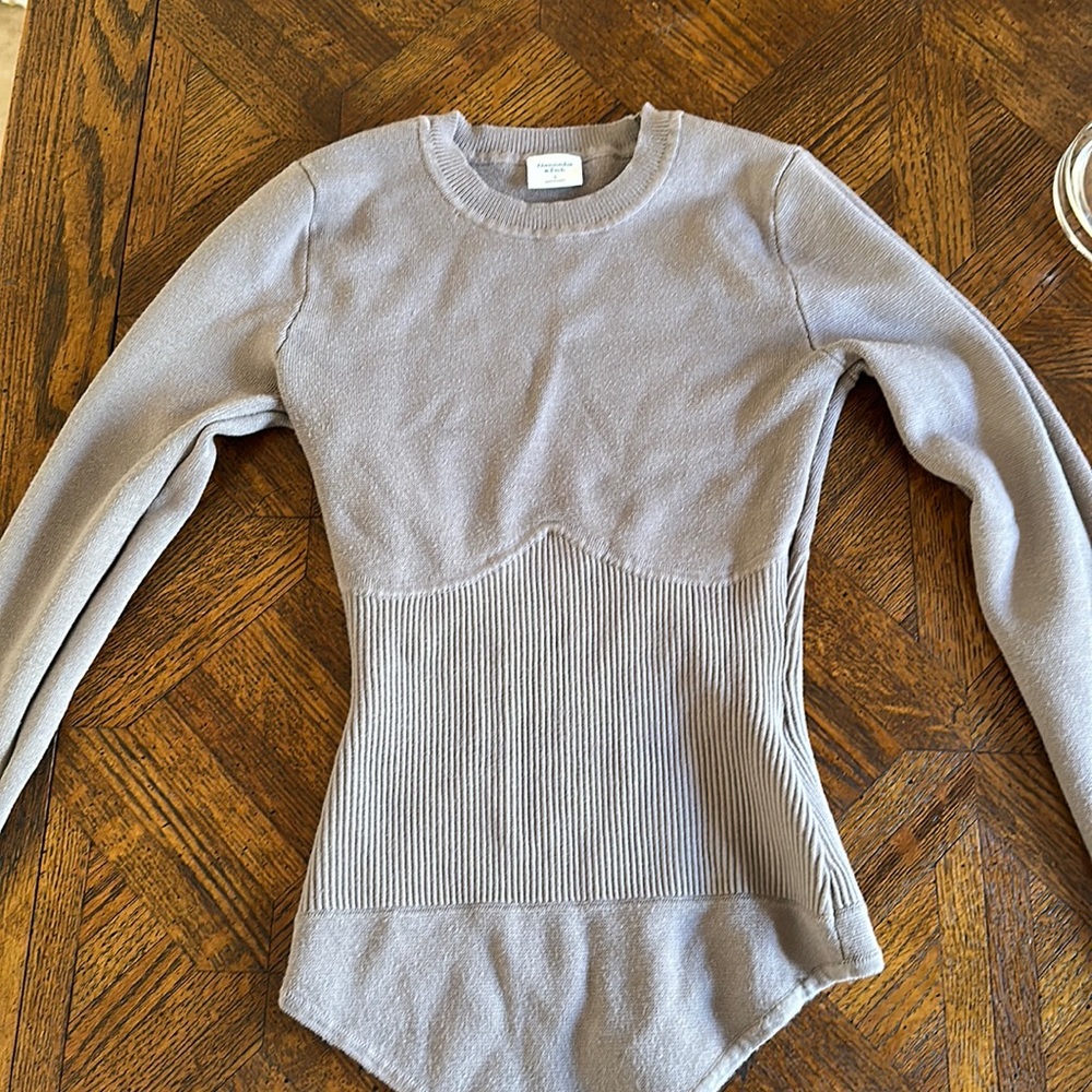 Long sleeve bodysuit. Worn a few times